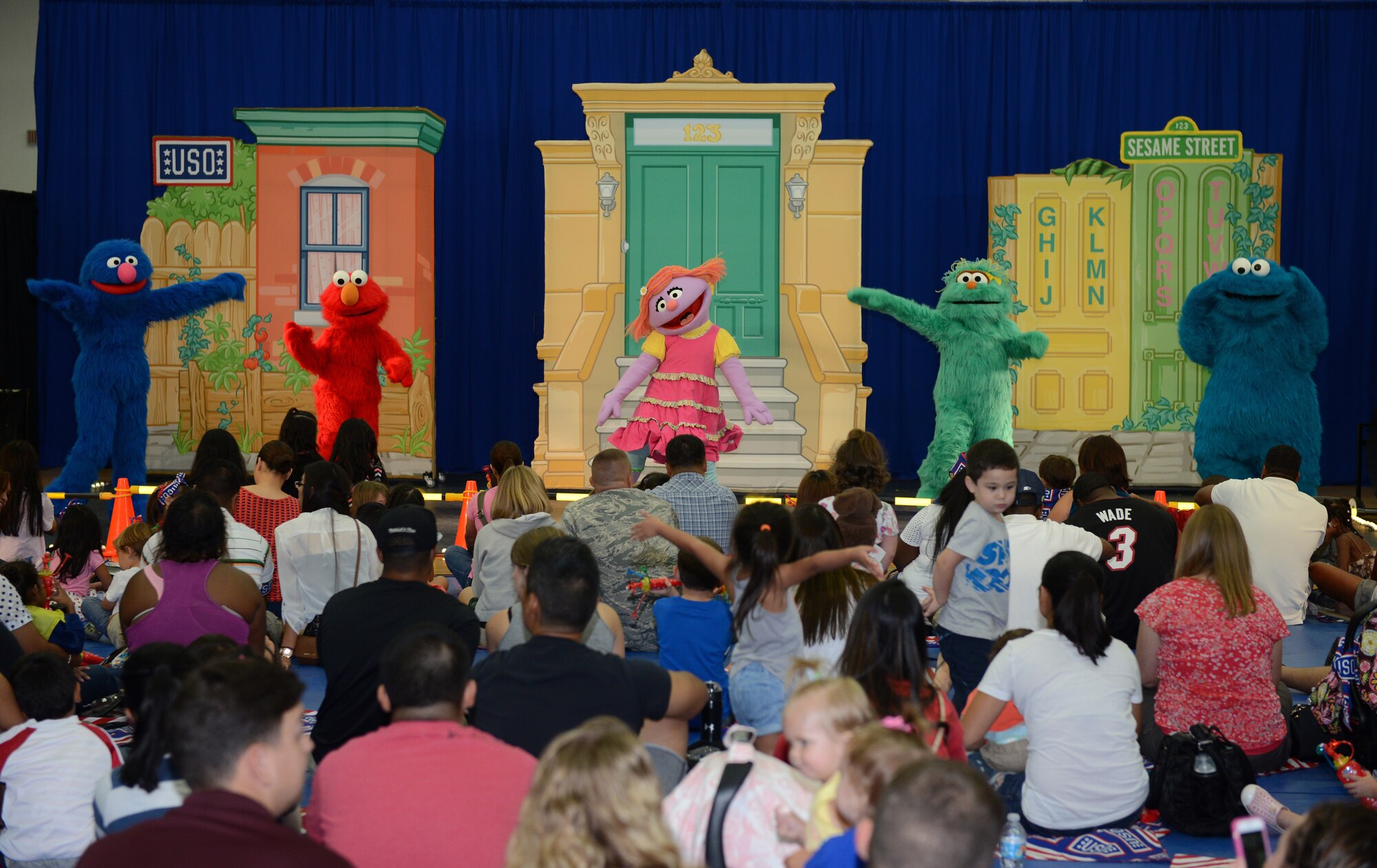 Characters from Sesame Street perform for military families during the Sesame Street United Service Organizations Experience for Military Families tour Sept. 19, 2015, on Andersen Air Force Base, Guam. The cast is scheduled to perform at more than 100 shows at 45 military bases in 9 countries this year. (U.S. Air Force photo by Airman 1st Class Arielle Vasquez/Released)