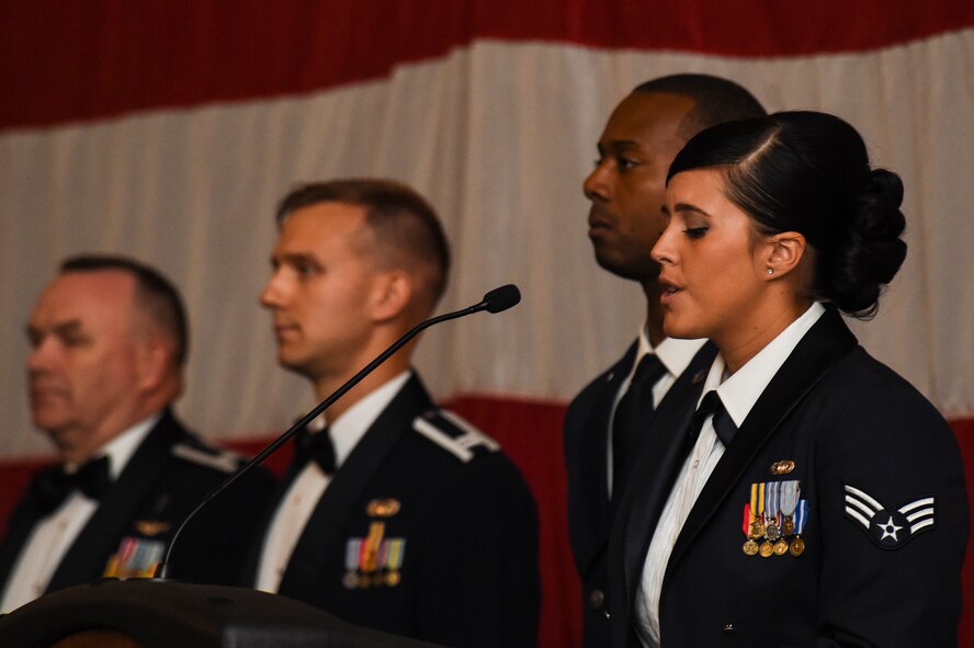 U.S. Air Force Senior Airman Jamie Zimmer, 347th Operations Support Squadron, sings the national anthem during the Air Force Ball Sept. 19, 2015, in Valdosta, Ga. Approximately 400 members of Team Moody, visitors, family and friends gathered to celebrate the Air Force's 68th birthday as a separate service. (U.S. Air Force photo by Senior Airman Ceaira Tinsley/Released)