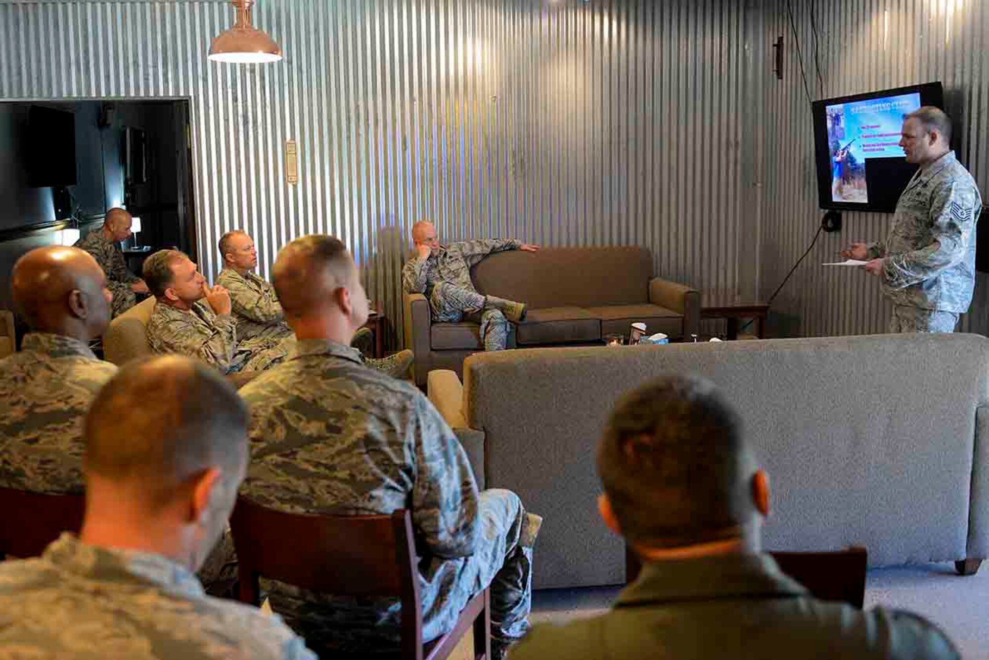 A member of the Seymour Johnson AFB Shooting Club briefs Maj. Gen. Mark Kelly, 9th Air Force commander, and Chief Master Sgt. Frank Batten, 9th AF command chief, about the club’s activities, Sept. 14, 2015, at Seymour Johnson Air Force Base, North Carolina. The Shooting Club is part of the 4th Fighter Wing’s “Make It Better” initiative, a quality of life program designed to bring Airmen who share common interests together and enhance their pillars of resilience. (U.S. Air Force photo/Airman 1st Class Ashley Williamson)