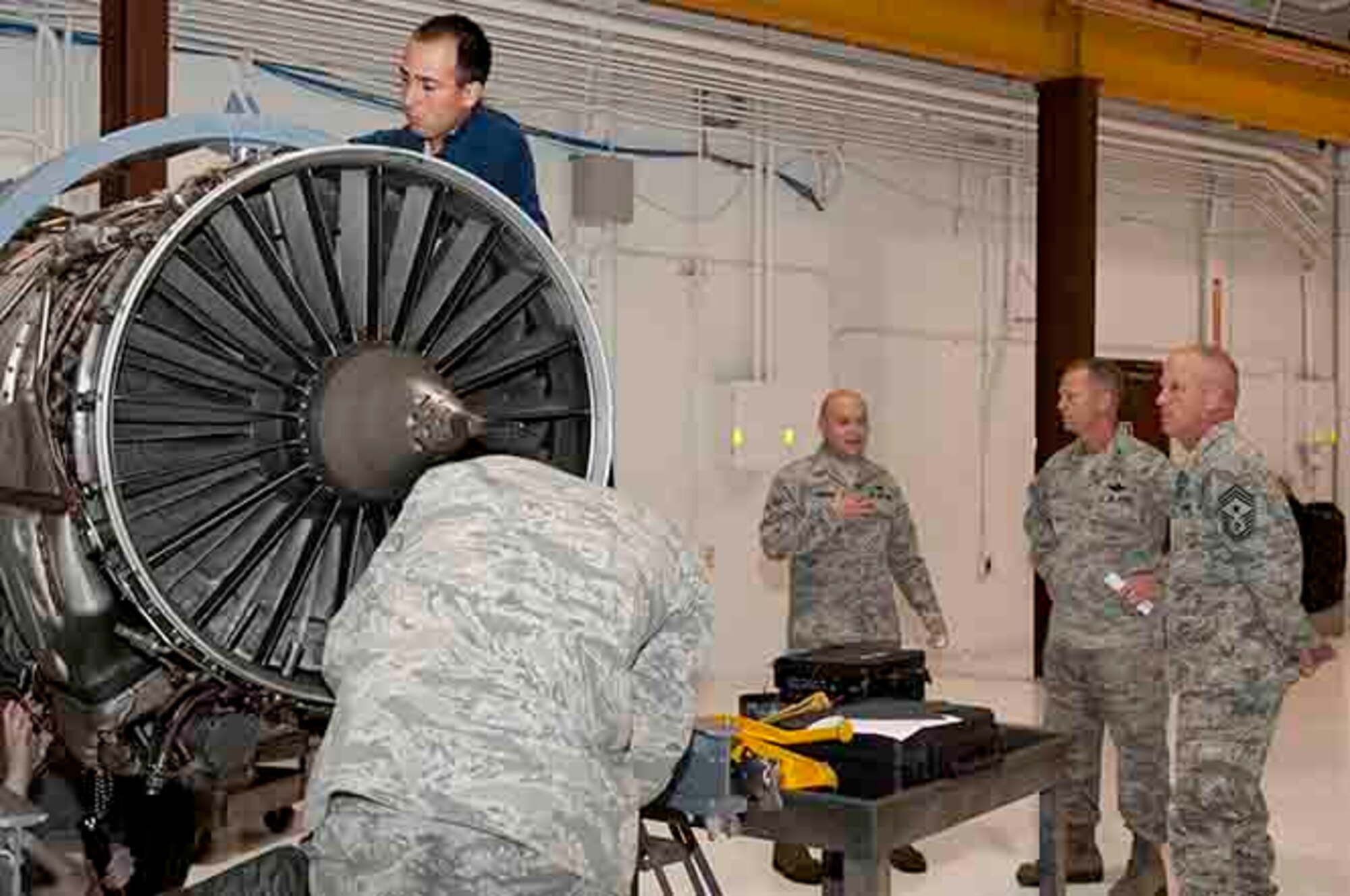 Airmen of the 4th Component Maintenance Squadron brief and demonstrate their jobs to Maj. Gen. Mark Kelly, 9th Air Force commander, and Chief Master Sgt. Frank Batten, 9th AF command chief, Sept. 14, 2015, at Seymour Johnson Air Force Base, North Carolina. The 4th CMS propulsion flight maintains more than 200 engines, the largest number in the Air Force. (U.S. Air Force photo/Airman 1st Class Shawna L. Keyes)
