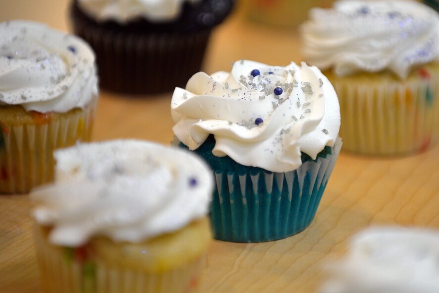 Silver and blue sprinkles adorn hundreds of cupcakes at a table set up in the Offutt Exchange entryway in celebration of the United States Air Force’s 68th birthday at Offutt Air Force Base, Neb.  President Harry S. Truman signed the National Security Act in 1947 establishing a separate military branch known as the U.S. Air Force.  (U.S. Air Force photo by Josh Plueger/Released)