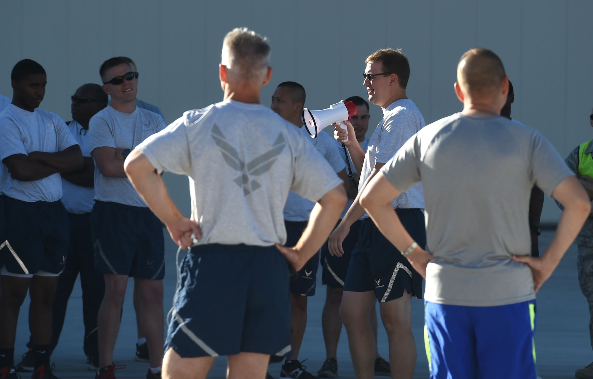 Col. James Chittenden, 432nd Wing/432nd Air Expeditionary Wing vice commander, address Airmen participating in the 432nd Maintenance Group Golden Bolt 5K run aimed at raising awareness on the effects foreign object debris (FOD) can have on aircraft and equipment at Creech Air Force Base, Nevada, Sept 14, 2015. (U.S. Air Force photo by Tech. Sgt. Nadine Barclay)  