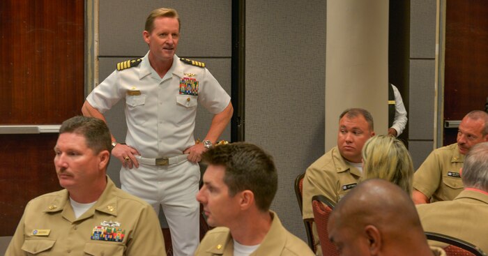 Navy Captain Scott Cooledge, outgoing Naval Science professor and commanding officer for the local Naval Reserve Officer Training Corps at the University of South Carolina, Columbia, SC, speaks to the audience at the Charleston Council Navy League Ombudsman luncheon at the Embassy Suites Convention Center in Charleston, SC, Sept. 17, 2015. Navy Captain Doug Walker, the new Navy ROTC commanding officer and professor of naval science at the USC, assumes command this week. (U.S. Air Force photo/Airman 1st Class Thomas T. Charlton)