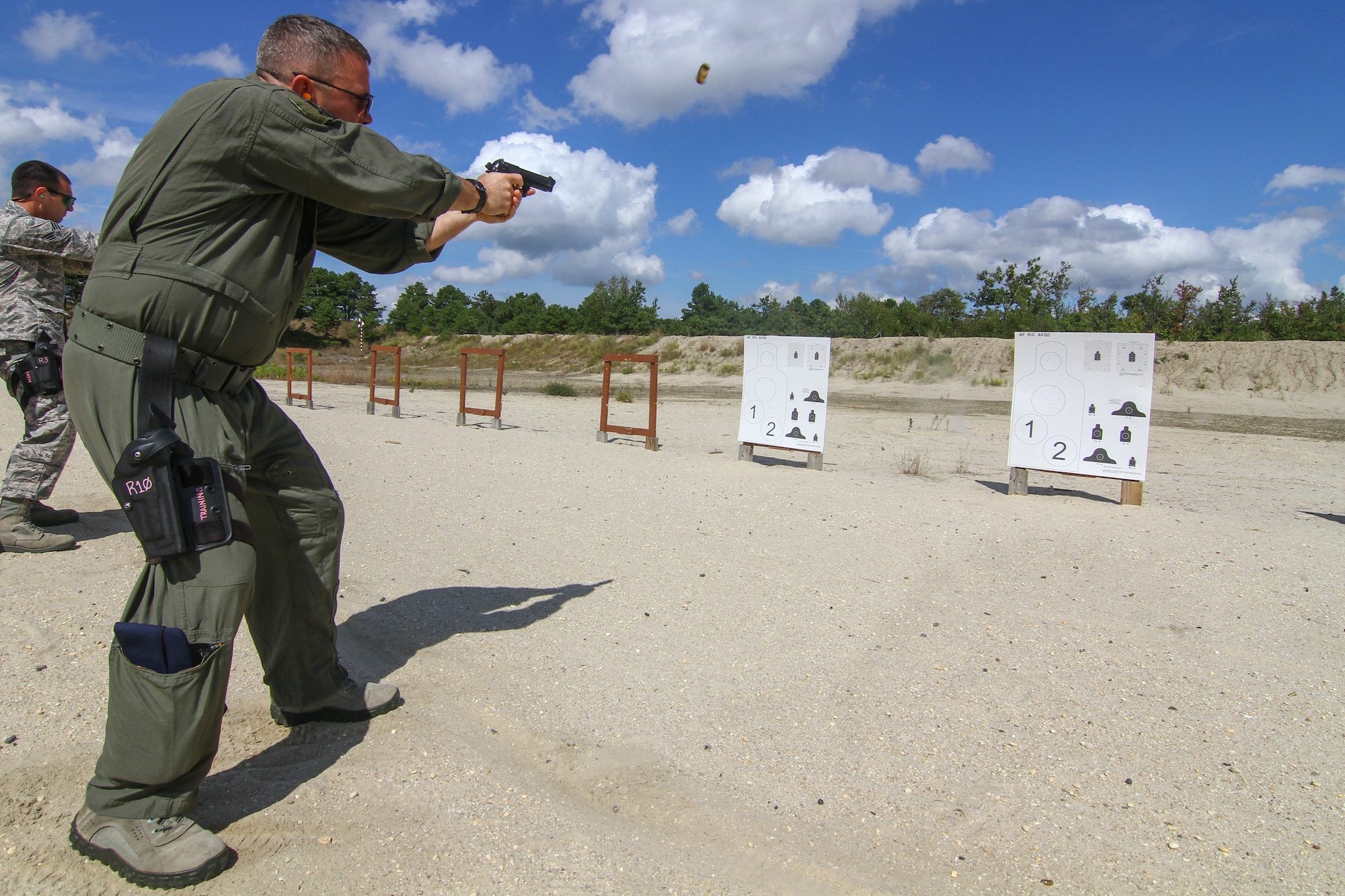 U.S. Air Force Senior Master Sgt. John Dipasquale from the New Jersey Air National Guard's 150th Special Operations Squadron fires the M9 pistol during qualification firing at Joint Base McGuire-Dix-Lakehurst, N.J., Sept. 19, 2015. (U.S. Air National Guard photo by Tech. Sgt. Matt Hecht/Released)