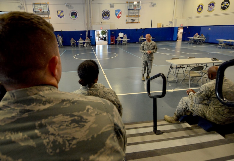 Chief Master Sgt. John Bentivegna, 50th Space Wing command chief, speaks to Airmen during a Developmental Special Duty Information Fair in the fitness center gym at Schriever Air Force Base, Colorado, Thursday, Sept. 17, 2015. This was the first DSD Information Fair of this caliber held at Schriever AFB and included a briefing from the career assistance advisor, as well as a question and answer session with representatives from each of the 10 DSD career fields. (U.S. Air Force photo/Staff Sgt. Debbie Lockhart)