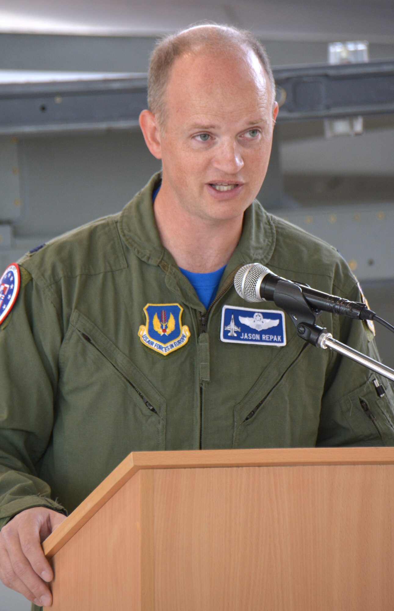 U.S. Air Force Lt. Col. Jason Repak, incoming commander of Detachment 1, 52nd Operations Group, speaks during a change of command ceremony at Lask Air Base, Poland, Sept. 18, 2015. Repak assumed command of the detachment from U.S. Air Force Lt. Col. Jack Harman. (U.S. Air Force photo by Master Sgt. Paul Gorman/Released)