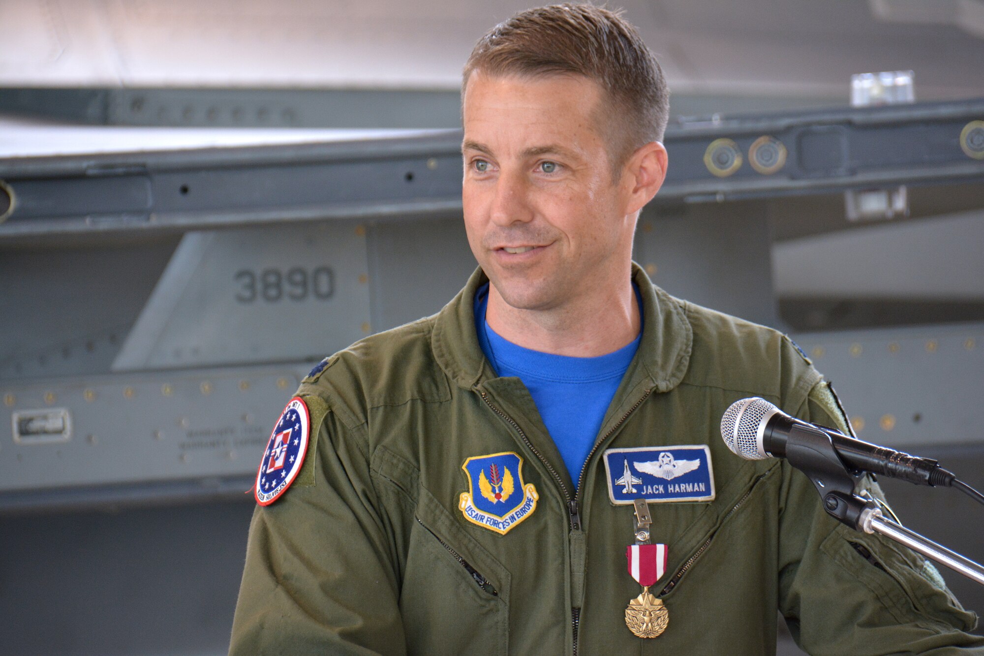 U.S. Air Force Lt. Col. Jack Harman, outgoing commander of Detachment 1, 52nd Operations Group, speaks during a change of command ceremony at Lask Air Base, Poland, Sept. 18, 2015. Harman relinquished command of the detachment to U.S. Air Force Lt. Col. Jason Repak, former director of operations for the 52nd Operations Support Squadron. (U.S. Air Force photo by Master Sgt. Paul Gorman/Released)