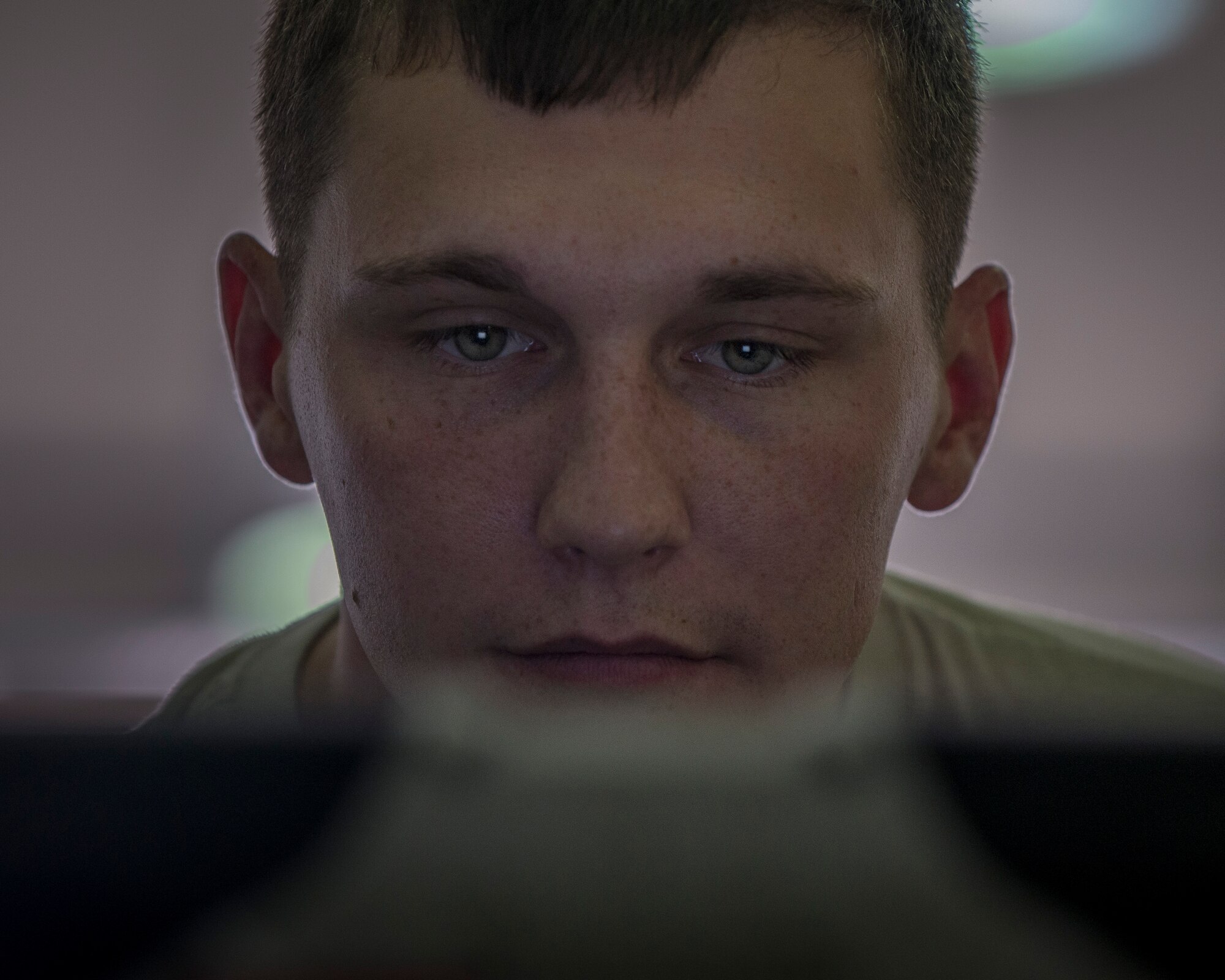 Senior Airman Michael Feagin, 39th Maintenance Squadron aerospace ground equipment technician, reads the manual for an MJ-1B bomb lift Sept. 17, 2015, at Incirlik Air Base Turkey. A detailed approach is taken when assembling the lift back together to ensure it is fully functional and mission ready. (U.S. Air Force photo by Airman 1st Class Cory W. Bush/Released)