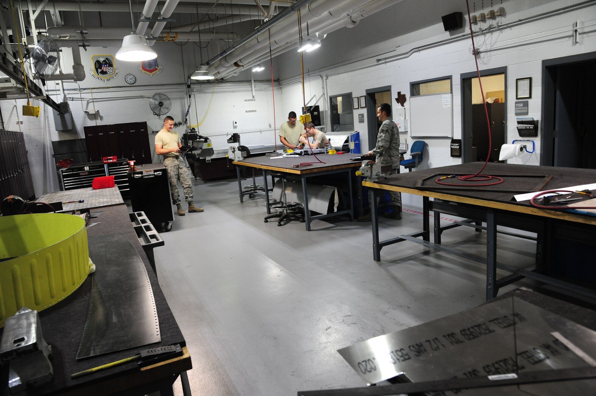 The structural maintenance shop works diligently at Whiteman Air Force Base, Mo., Sept. 15, 2015. Whenever aircraft parts are damaged, they are sent to the structural maintenance shop to repair and return back onto the aircraft. (U.S. Air Force photo by Senior Airman Keenan Berry/Released)
