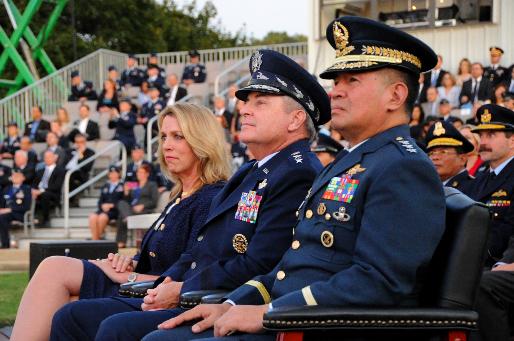 Secretary of the Air Force Deborah Lee James, Air Force Chief of Staff, Gen. Mark A. Welsh III, and Lt. Gen. Jeffrey Delgado, Philippine Air Force Commanding General, observe the United States Air Force Tattoo Sept. 17, 2015. The Air Force District of Washington commemorated the United States Air Force's 68th birthday with a celebration of music, drill and ceremony, aircraft, and fireworks on the Air Force Ceremonial Lawn at Joint Base Anacostia-Bolling. The event featured flyovers of several aircraft including the Air Force Thunderbirds and a Warbird vintage aircraft squadron, as well as performances by the Air Force Band and Honor Guard. (U.S. Air Force photo/Staff Sgt. Matt Davis)