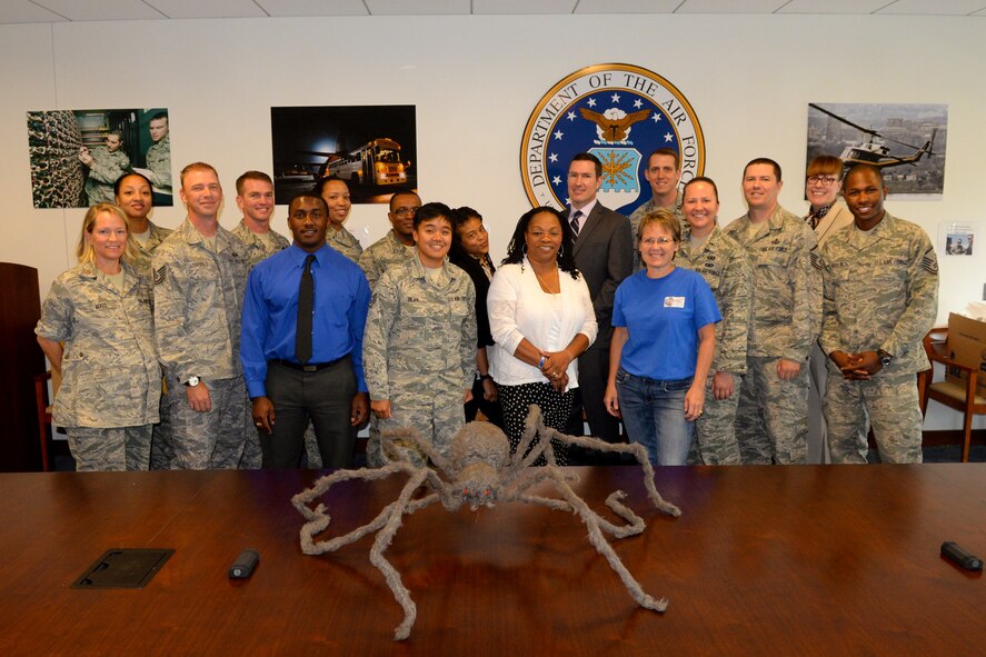 Air Force District of Washington volunteers packaged 18 care packages for AFDW deployed members September 21, 2015 on Joint Base Andrews, Md. The packages were filled with snacks and decorations to celebrate the Thanksgiving and Halloween holidays away from home. Since 2009, AFDW has sent 316 care packages to service members around the globe. (U.S. Air Force photo/1st Lt. Esther Willett)