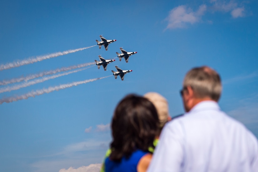 Gen. Mark A. Welsh III, Air Force Chief of Staff, and his family, watch the U.S. Air Force Thunderbirds fly in diamond formation during the 2015 Joint Base Andrews Air Show, Sept. 19. (U.S. Air Force photo/Airman 1st Class Ryan J. Sonnier/Released)
