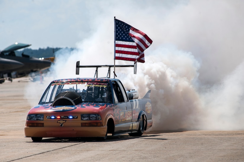 The Flash Fire Jet Truck drives down the flightline during the 2015 Joint Base Andrews Air Show, Sept. 19. The Flash Fire Jet Truck has a top speed of 375 mph and has 12,000 horsepower.  (U.S Air Force photo by Airman 1st Class Philip Bryant/Released)