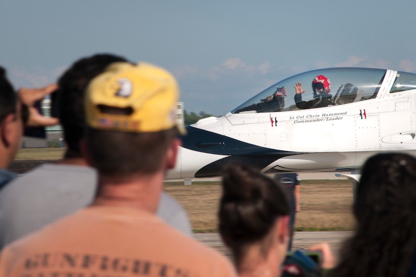 Lt. Col. Chris Hammond, U.S. Air Force Thunderbird’s commander, waves to the crowd from the cockpit of his F-16 Fighting Falcon during the 2015 Joint Base Andrews Air Show, Sept. 19. (U.S Air Force photo by Airman 1st Class Philip Bryant/Released) 