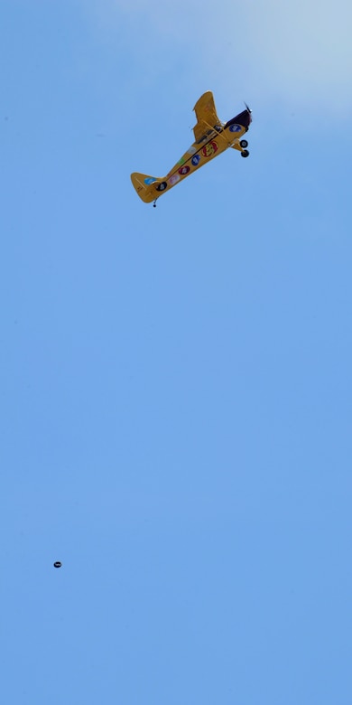 Kent Pietsch loses a wheel performs an aerial comedy routine at the 2015 Joint Base Andrews Air Show Sept. 19, 2015. During the show, Pietsch also managed to land the aircraft on top of a moving recreational vehicle. (U.S. Air Force photos by Senior Airman Preston Webb/RELEASED)