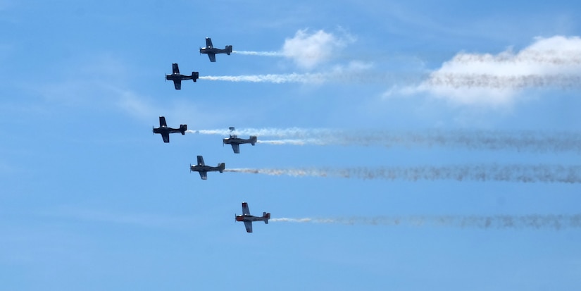 The Trojan Horsemen fly over the 2015 Joint Base Andrews Air Show Sept. 19, 2015. The Trojan Horsement performed multiple aerial formations and even simulated a bombing run during the show. (U.S. Air Force photos by Senior Airman Preston Webb/RELEASED)