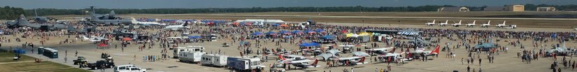 Visitors view static displays at the 2015 Joint Base Andrews Air Show Sept. 19, 2015. The public was able to view several aircraft such as the C-17 Globemaster, KC-135 Stratotanker, and A-10 Warthog as well as aerial displays by stunt aircraft, F-16s and an F-22 Raptor throughout the event.(U.S. Air Force photos by Senior Airman Preston Webb/RELEASED)