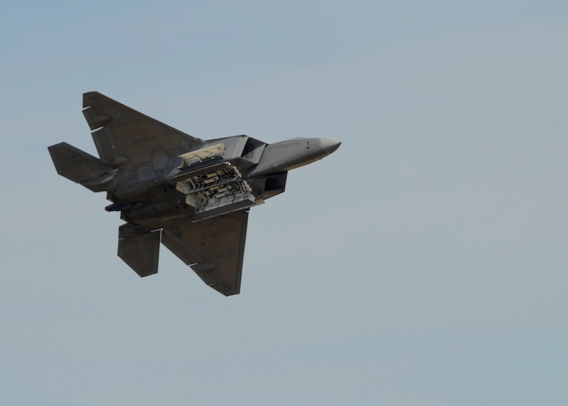 An F-22 Raptor opens it's bomb-bay doors for onlookers at the 2015 Joint Base Andrews Air Show Sept. 19, 2015. Bombs must be stored internally for the sake of stealth. (U.S. Air Force photos by Senior Airman Preston Webb/RELEASED)