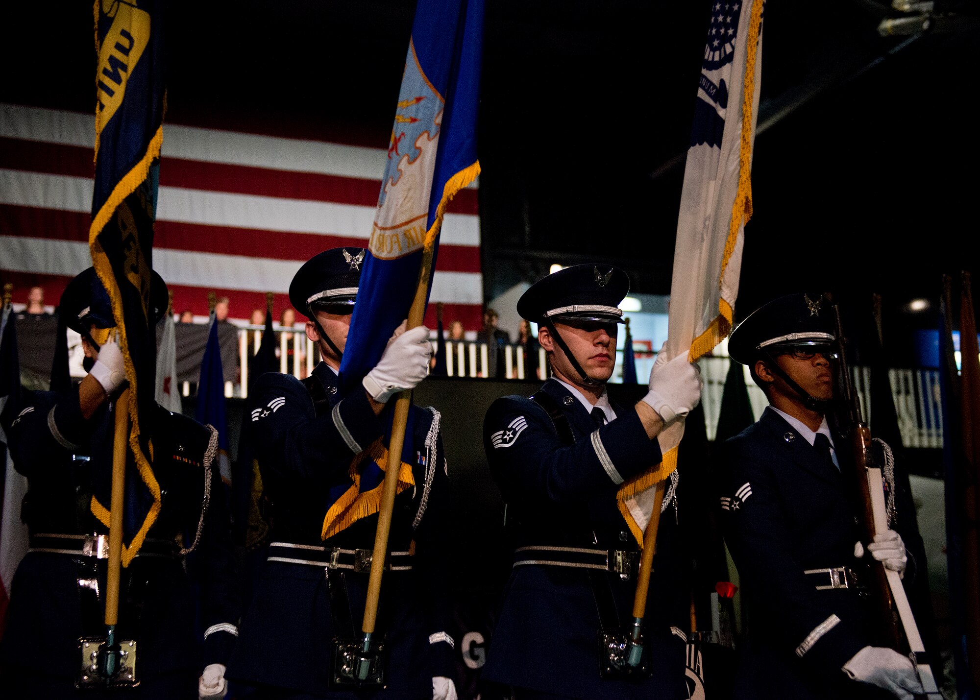 The Eglin Air Force Base honor guard presents the colors during the POW/MIA remembrance ceremony Sept. 18 at the Air Force Armament Museum.  The ceremony paid tribute to those military members who have yet to return home from defending America. The event featured tributes, guest speakers and honor guard procedures. (U.S. Air Force photo/Samuel King Jr.)