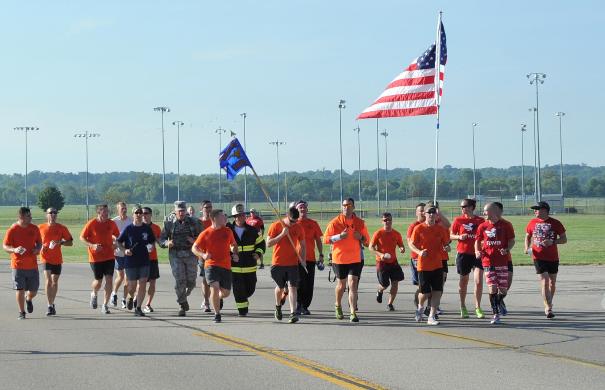 A group of first responders runs together in the Run for the Fallen on Sept. 11 in Area B at Wright-Patterson Air Force Base. (Air Force photo by Al Bright)