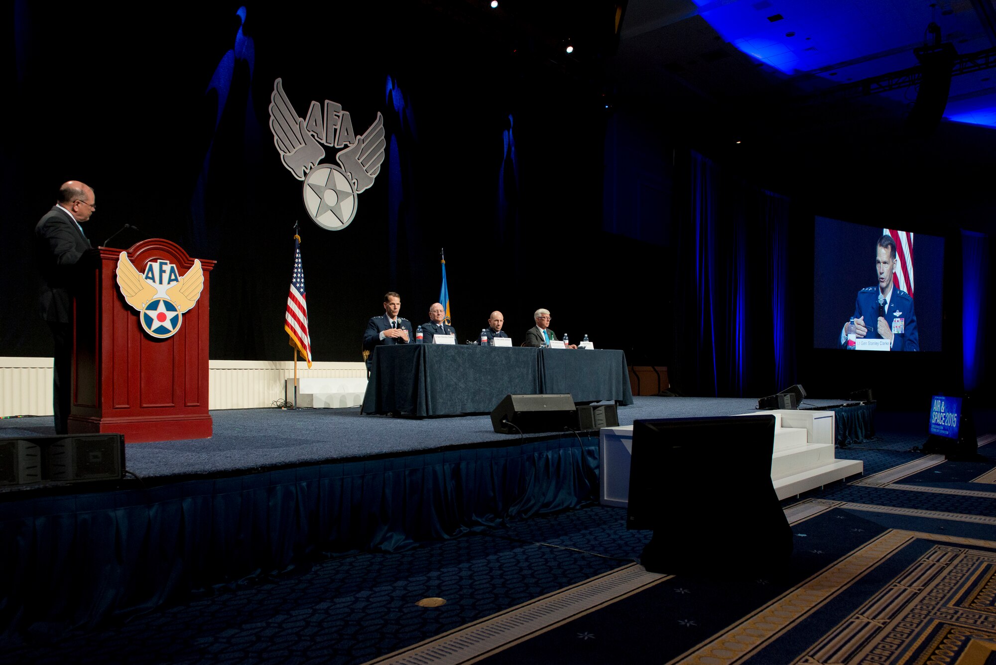 Lt. Gen. Stanley E. Clarke III, the director of the Air National Guard responds to a question during the Total Force panel at the Air Force Association's Air and Space Conference and Technology Exposition in National Harbor, Md., Sept. 16, 2015. The other members of the panel were Lt. Gen James Jackson, commander of the Air Force Reserve Command and chief of Air Force Reserves, Lt. Gen James Holmes, deputy chief of staff for Strategic Plans and Requirements and Daniel Sitterly, principal deputy Assistant Secretary of the Air Force for Manpower and Reserve Affairs. (U.S. Air National Guard photo/Master Sgt. Marvin R. Preston/Released)