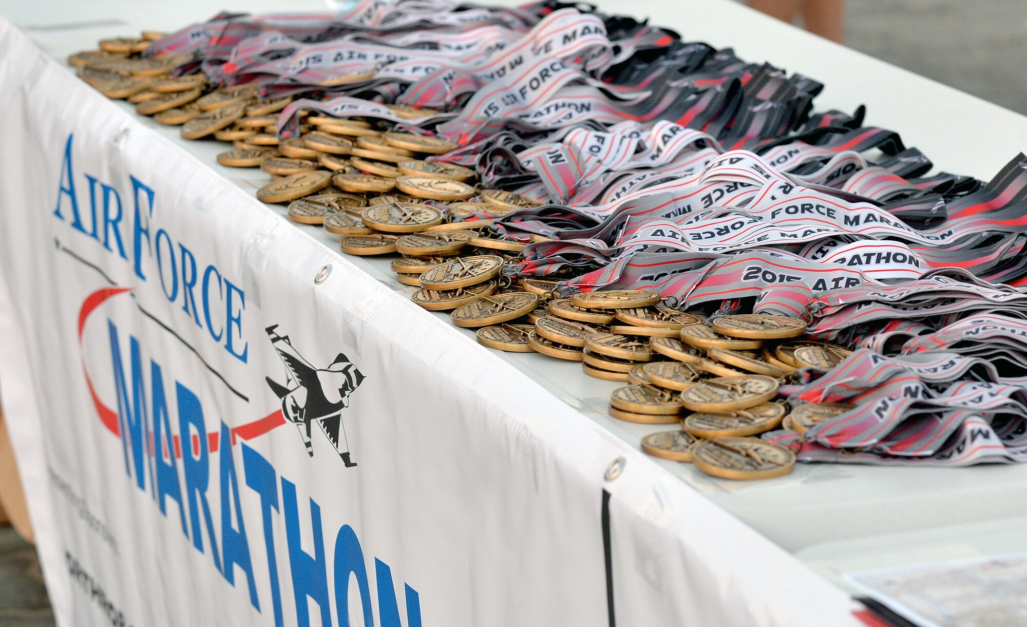 Air Force marathon medals sit on a table at undisclosed location in Southwest Asia Sept. 19, 2015. The medals were presented to participants upon completion of the run.  (U.S. Air Force photo/Tech. Sgt. Jeff Andrejcik)