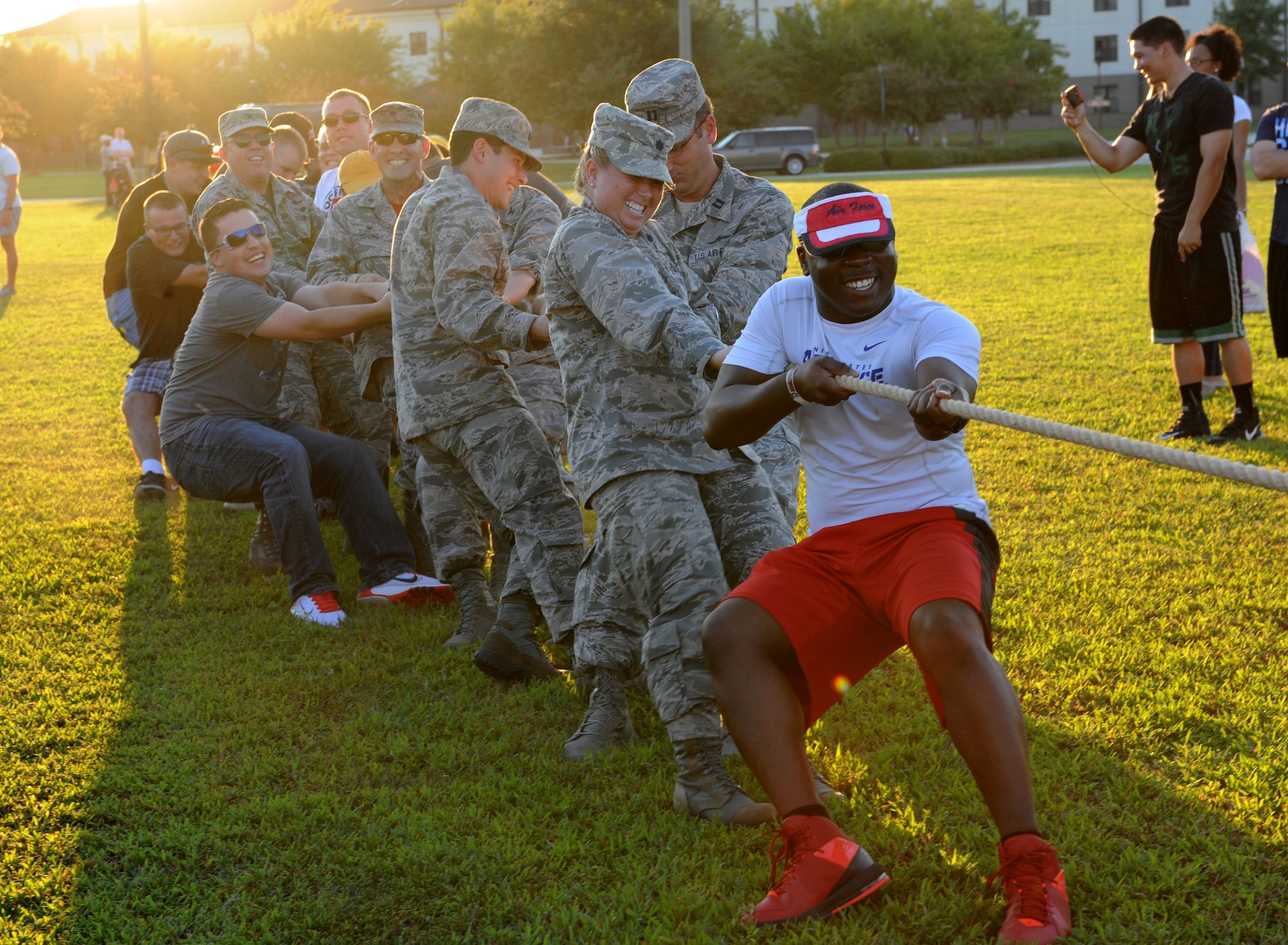 Keesler commanders and 81st Training Group students compete in a game of tug-of-war during Keesler’s Air Force birthday celebration Sept. 18, 2015, Keesler Air Force Base, Miss. The event also included a cake cutting ceremony, music, games, contests and food to celebrate the Air Force’s 68th birthday.   (U.S. Air Force photo by Kemberly Groue)