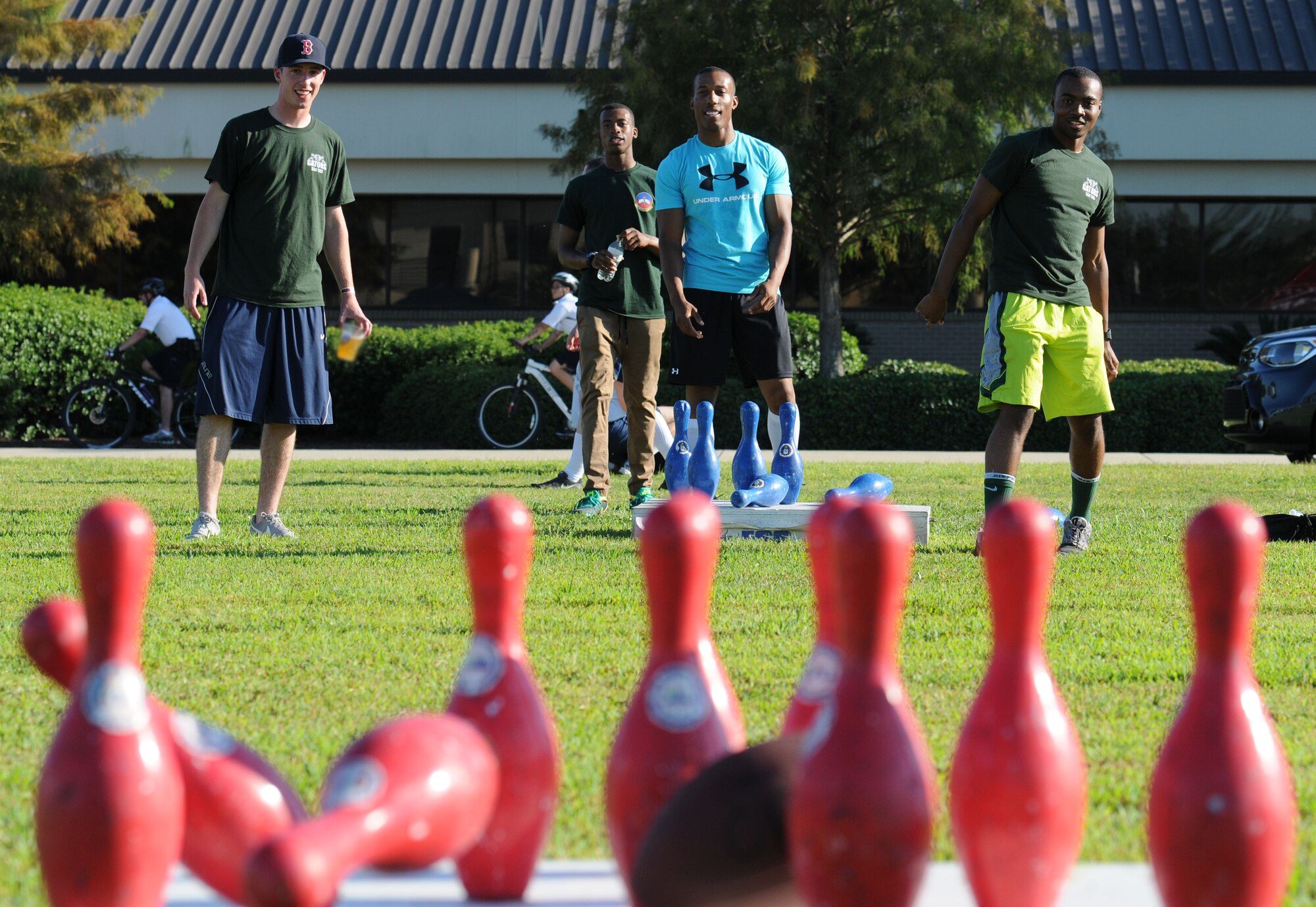 Students from the 334th Training Squadron play a game of football bowling during Keesler’s Air Force birthday celebration Sept. 18, 2015, Keesler Air Force Base, Miss. The event also included music, games, contests and food to celebrate the Air Force’s birthday.  (U.S. Air Force photo by Kemberly Groue)