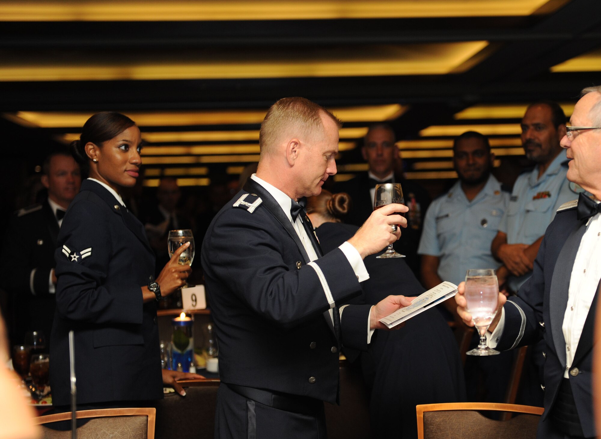Col. Dennis Scarborough, 81st Training Wing vice commander, gives a toast to the secretary of the Air Force during the Keesler Air Force Ball on Sept. 19, 2015, at the Imperial Palace Casino, Biloxi, Miss. The event was sponsored by the Air Force Association John C. Stennis Chapter #332 to celebrate the Air Force’s 68th birthday. (U.S. Air Force photo by Kemberly Groue)