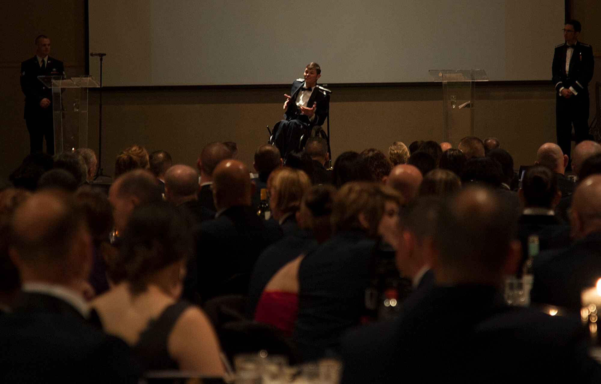 U.S. Air Force Capt. Nathan Nelson, 24th Special Operations Wing Special Tactics intelligence officer, relays the story of his experiences of being disabled after a rocket blast in Afghanistan during the Goodfellow Air Force Ball at the McNease Convention Center in San Angelo, Texas, Sept. 18, 2015. Nelson was invited to the Air Force Ball as a guest speaker to explain the struggle of his experiences and how he’s gotten through it. (U.S. Air Force photo by Airman Caelynn Ferguson/Released)