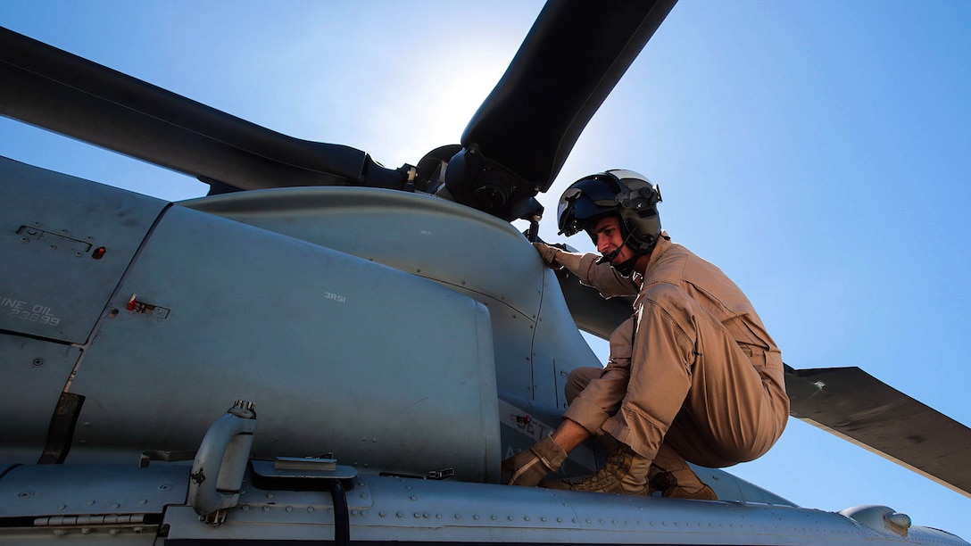 Ogden, Utah, native, 1st Lt. Daniel Wilde, a UH-1Y Huey pilot with Marine Light Attack Helicopter Squadron 169 (HMLA-169), Marine Aircraft Group 39, 3rd Marine Aircraft Wing, I Marine Expeditionary Force, conducts pre-flight checks aboard Marine Corps Base Camp Pendleton, Calif., Sept. 17, 2015. Wilde flew the Huey during weapons proficiency training designed to help new pilots become more comfortable employing the different weapons systems on the aircraft. 