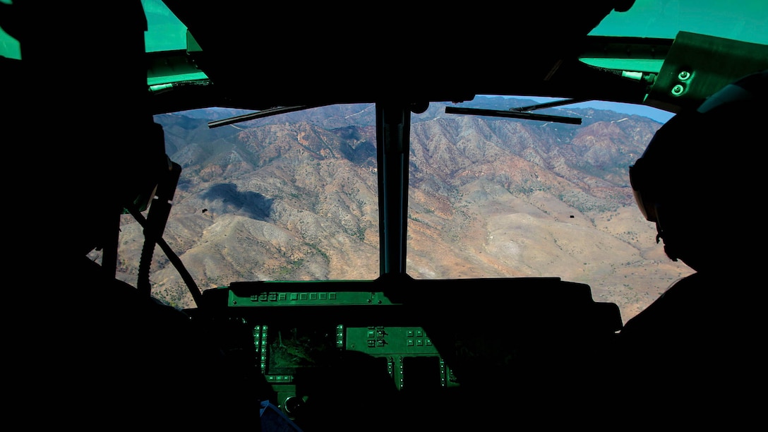 UH-1Y pilots with Marine Light Attack Helicopter Squadron 169 (HMLA-169), Marine Aircraft Group 39, 3rd Marine Aircraft Wing, I Marine Expeditionary Force, begin the dive toward their target aboard Marine Corps Base Camp Pendleton, Calif., Sept. 17, 2015. The flight was part of a weapons proficiency training designed to help new pilots become more comfortable employing the different weapons systems on the aircraft.