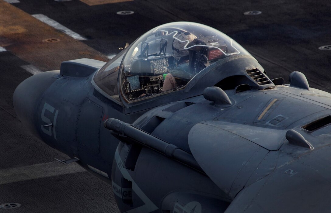 ARABIAN GULF (Sept. 19, 2015) An AV-8B Harrier with Medium Marine Tiltrotor Squadron 161 (Reinforced), 15th Marine Expeditionary Unit, returns to the amphibious assault ship USS Essex (LHD 2) after flying missions in support of Operation Inherent Resolve. The 15th MEU is embarked aboard the Essex Amphibious Ready Group and deployed to maintain regional security in the U.S. 5th Fleet area of operations. (U.S. Marine Corps photo by Cpl. Elize McKelvey/Released)