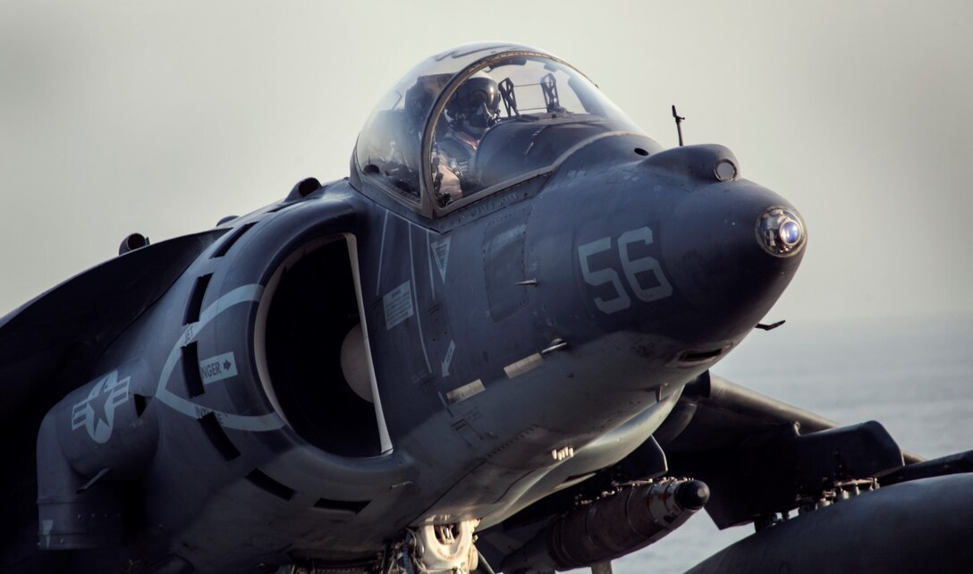 ARABIAN GULF (Sept. 19, 2015) An AV-8B Harrier with Medium Marine Tiltrotor Squadron 161 (Reinforced), 15th Marine Expeditionary Unit, returns to the amphibious assault ship USS Essex (LHD 2) after flying missions in support of Operation Inherent Resolve. The 15th MEU is embarked aboard the Essex Amphibious Ready Group and deployed to maintain regional security in the U.S. 5th Fleet area of operations. (U.S. Marine Corps photo by Cpl. Elize McKelvey/Released)