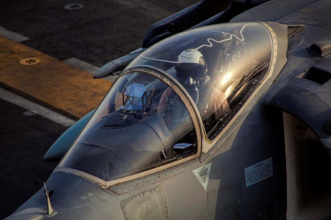 ARABIAN GULF (Sept. 19, 2015) An AV-8B Harrier with Medium Marine Tiltrotor Squadron 161 (Reinforced), 15th Marine Expeditionary Unit, returns to the amphibious assault ship USS Essex (LHD 2) after flying missions in support of Operation Inherent Resolve. The 15th MEU is embarked aboard the Essex Amphibious Ready Group and deployed to maintain regional security in the U.S. 5th Fleet area of operations. (U.S. Marine Corps photo by Cpl. Elize McKelvey/Released)