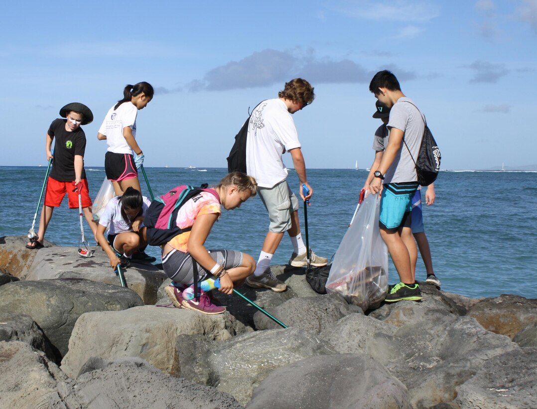 More than 50 volunteers picked up trash at Fort DeRussy in Waikiki in honor of National Public Lands Day Sept. 19. The Corps of Engineers’ Regional Visitor Center (RVC) coordinated the event which was supported by Corps employees, U.S. Army Transporters from the 545th Transportation Company, and Punahou Junior ROTC cadets. Also participating were Pacific Ocean Division Commander, Brig. Gen. Jeffrey L. Milhorn and POD Command Sgt. Major Federico E. Boyce, and Honolulu District Commander Lt. Col. Chris and Mrs. Maria Crary and District Deputy Commander Maj. Brennan V. Wallace. About 35 cadets led by Punahou JROTC Commander Lt. Col. Robert Takao concentrated their efforts on cleaning up the beach berm behind historic Battery Randolph. National Public Lands Day is the largest single-day volunteer effort for public lands in the U.S. It began in 1994 and focuses on education and partnerships to care for the nation’s natural treasures. 
