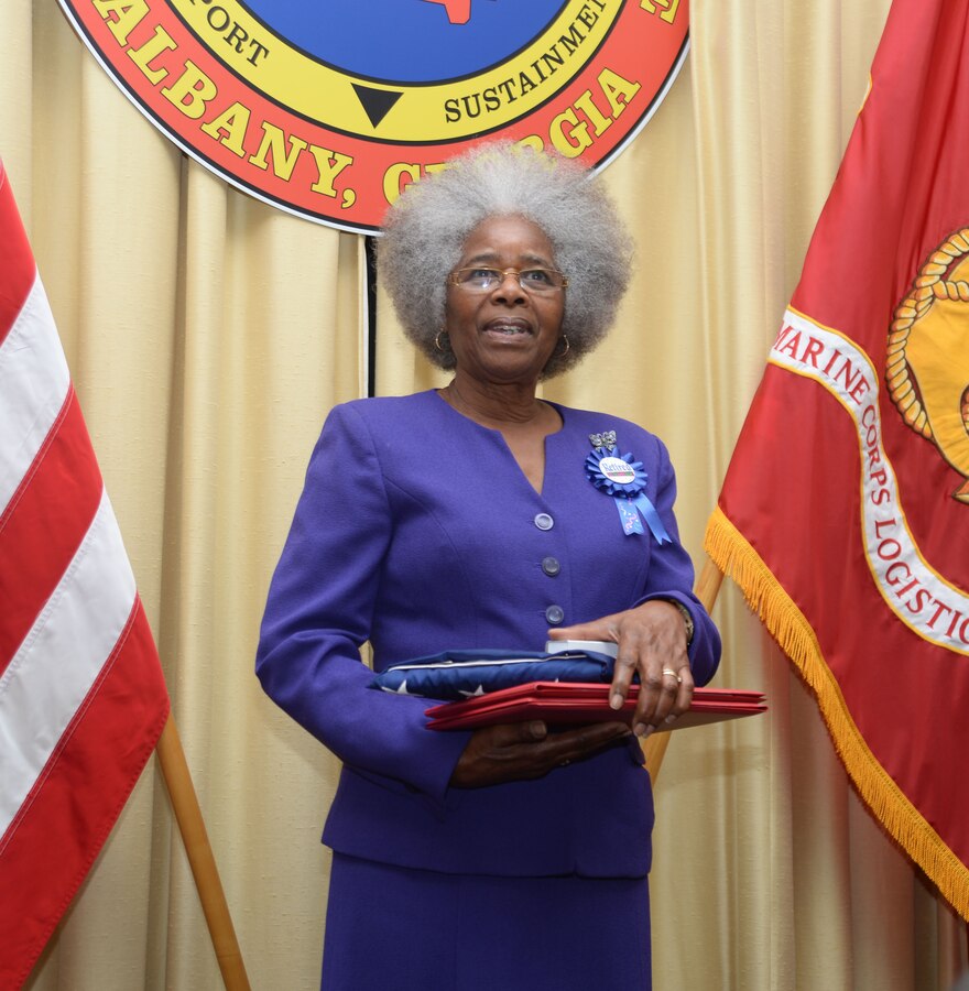 Annette Williams, financial management analyst, Accounting Branch, Marine Corps Logistics Base Albany, addresses attendees at her retirement ceremony, Sept 22. During the celebration, Col. James C. Carroll III, commanding officer, MCLB Albany, assisted by Kent Morrison, executive director, MCLB Albany, presented Williams with an American flag, which flew over Coffman Hall on her behalf as well as other certificates honoring her 29 years of service to both MCLB Albany and Marine Corps Logistics Command.