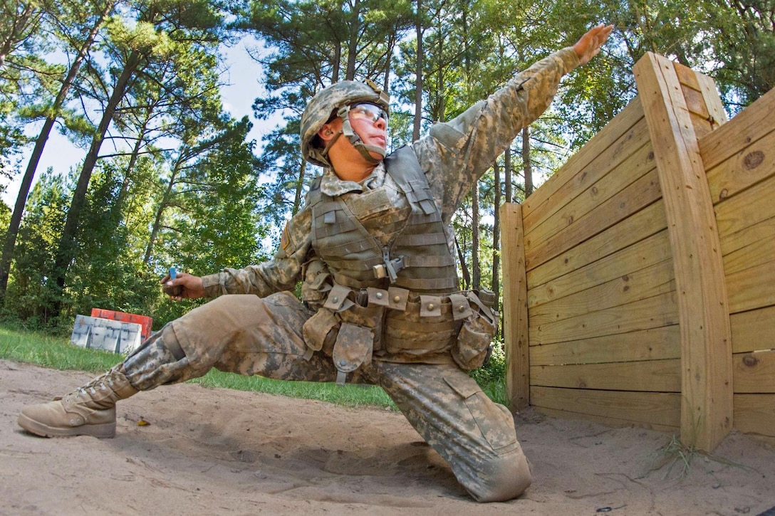 An Army cadet aims before throwing a hand grenade during basic training on Fort Jackson, S.C., Sept. 19, 2015. U.S. Army photo by Sgt. Ken Scar