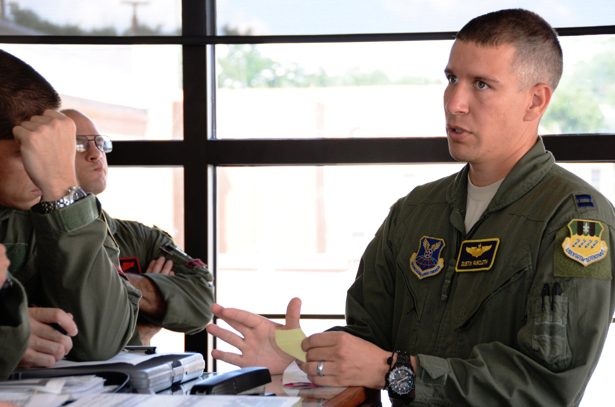 Capt. Dustin Faircloth, 2nd Operations Support Squadron, briefs B-52 Stratofortress aircrew prior to flight at Barksdale Air Force Base, La., Sept. 17, 2015. The aircrew participated in Immediate Response, a multinational brigade-level exercise utilizing computer-assisted simulations and field training exercises in Croatia and Slovenia. (U.S. Air Force photo/Senior Airman Amanda Morris)