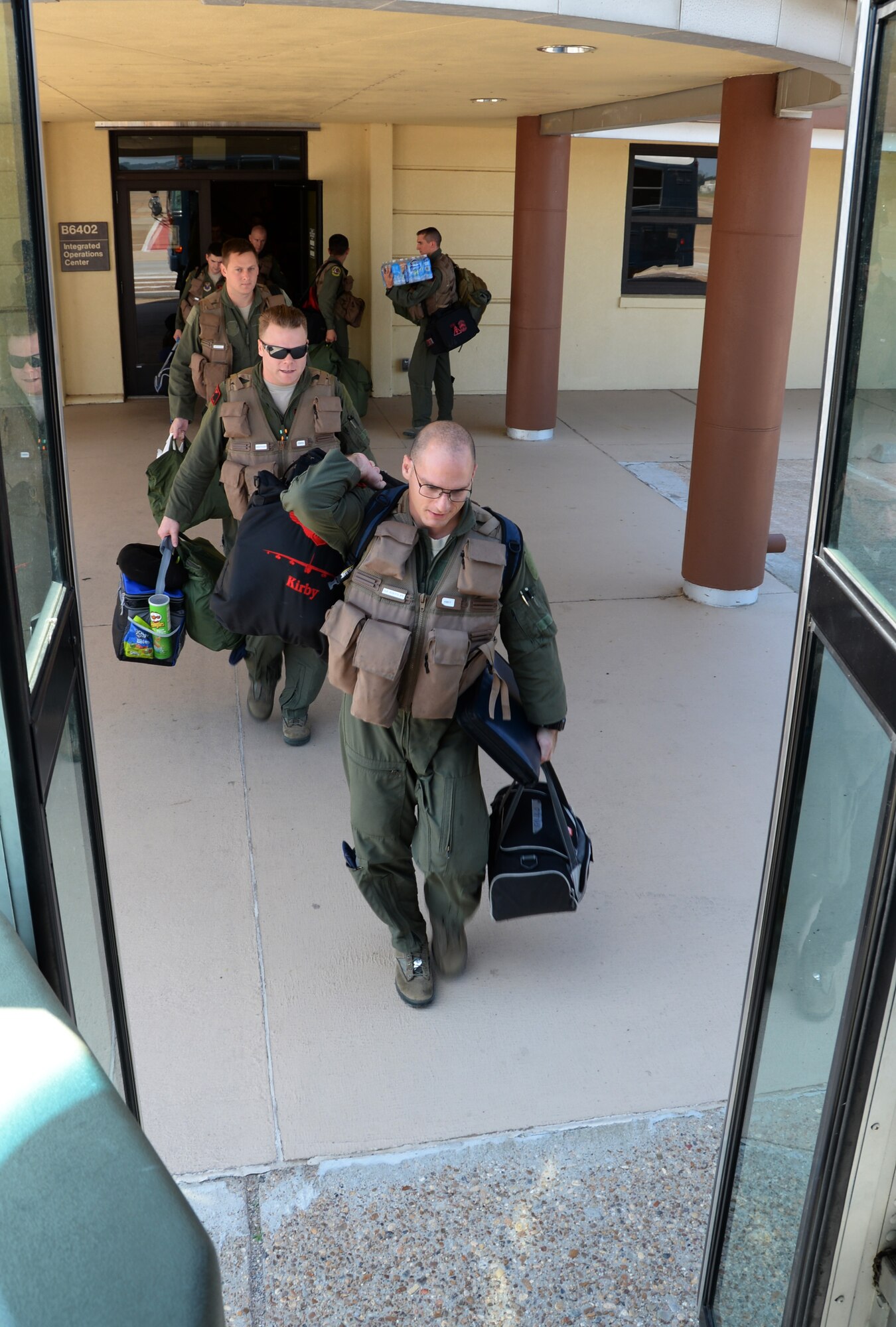 A B-52 Stratofortress aircrew assigned to Air Force Global Strike Command, walk to a bus in preparation for Immediate Response 2015 at Barksdale Air Force Base, La., Sept. 17. Immediate Response activities were built upon a scenario designed to enhance regional stability, strengthen partner capacity and improve interoperability between partner nations. (U.S. Air Force photo/Senior Airman Amanda Morris)
