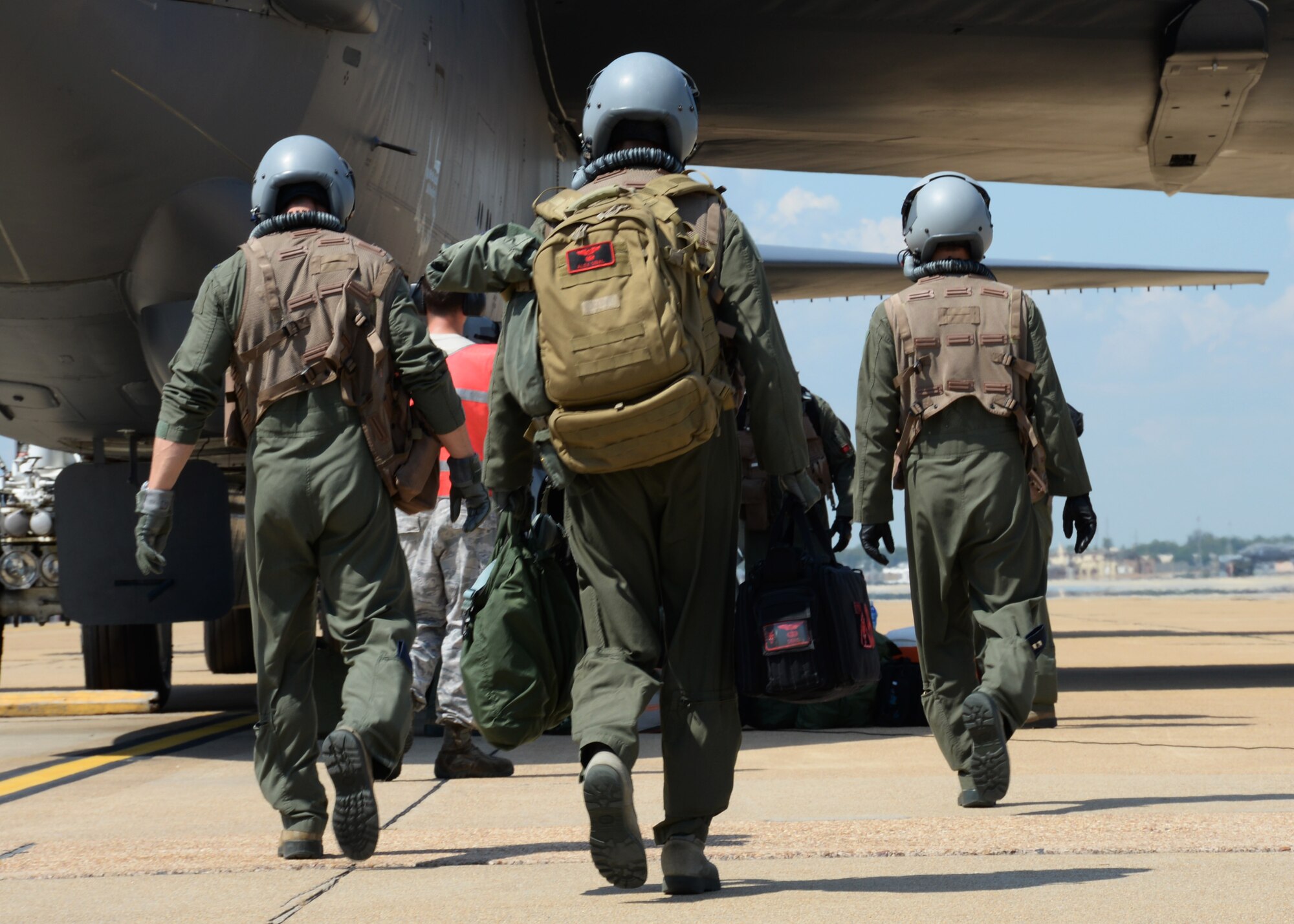 A B-52 Stratofortress aircrew assigned to Air Force Global Strike Command makes their way to the aircraft before participating in Immediate Response 2015 at Barksdale Air Force Base, La., Sept. 17. The exercise supports the goal of a “Strong Europe” in that partner nations are trained and ready to combine forces to ensure unified security across allied nations. (U.S Air Force photo/Senior Airman Amanda Morris)