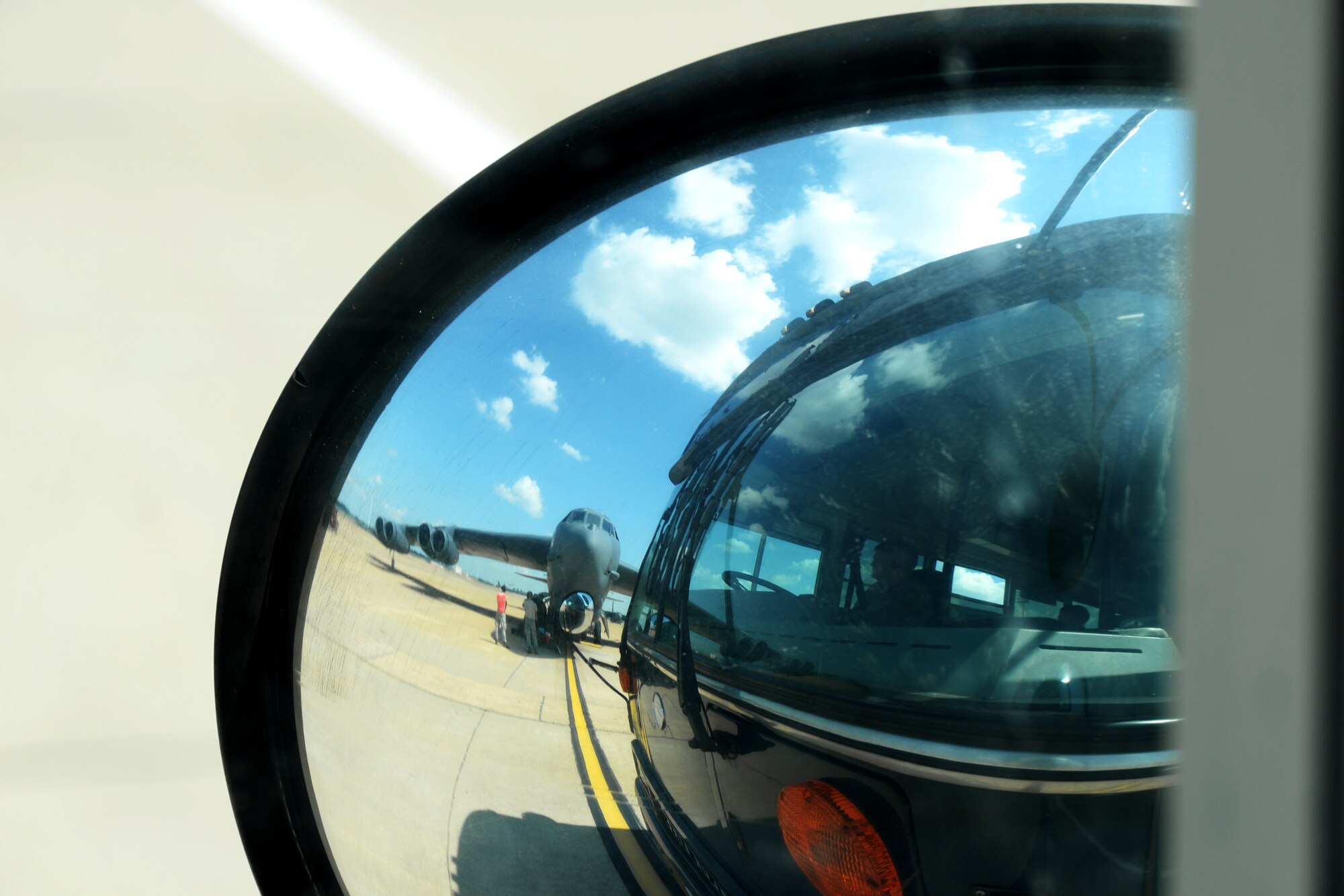 A bus parks in front of a B-52 Stratofortress before dropping off aircrew for a long-range bomber mission at Barksdale Air Force Base, La., Sept. 17, 2015. The aircrew participated in Immediate Response, a multinational, brigade-level exercise utilizing computer-assisted simulations and field training exercises in Croatia and Slovenia. (U.S. Air Force photo/Senior Airman Amanda Morris)