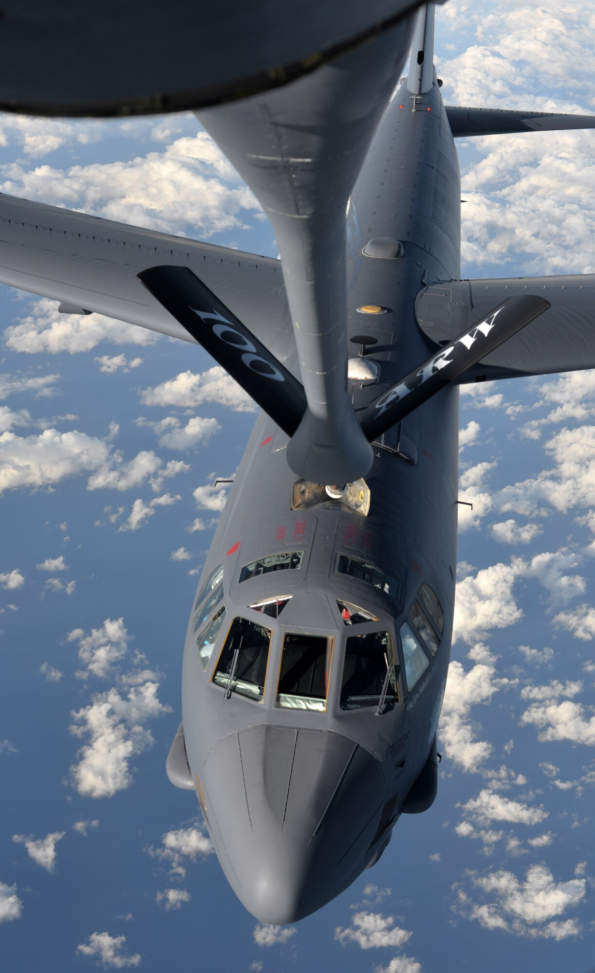 A B-52 Stratofortress from Barksdale Air Force Base, Louisiana, takes fuel from a KC-135 Stratotanker assigned to the 100th Air Refueling Wing at RAF Mildenhall, England, Sept. 18, 2015, in the skies near Spain. The refueling was part of Operation Immediate Response, which included a three-ship formation of KC-135s delivering a total of 180,000 pounds of fuel to the sole bomber. The KC-135 was designed and built during the Cold War specifically to deliver fuel to the B-52. (U.S. Air Force photo by Tech. Sgt. Austin M. May/Released)