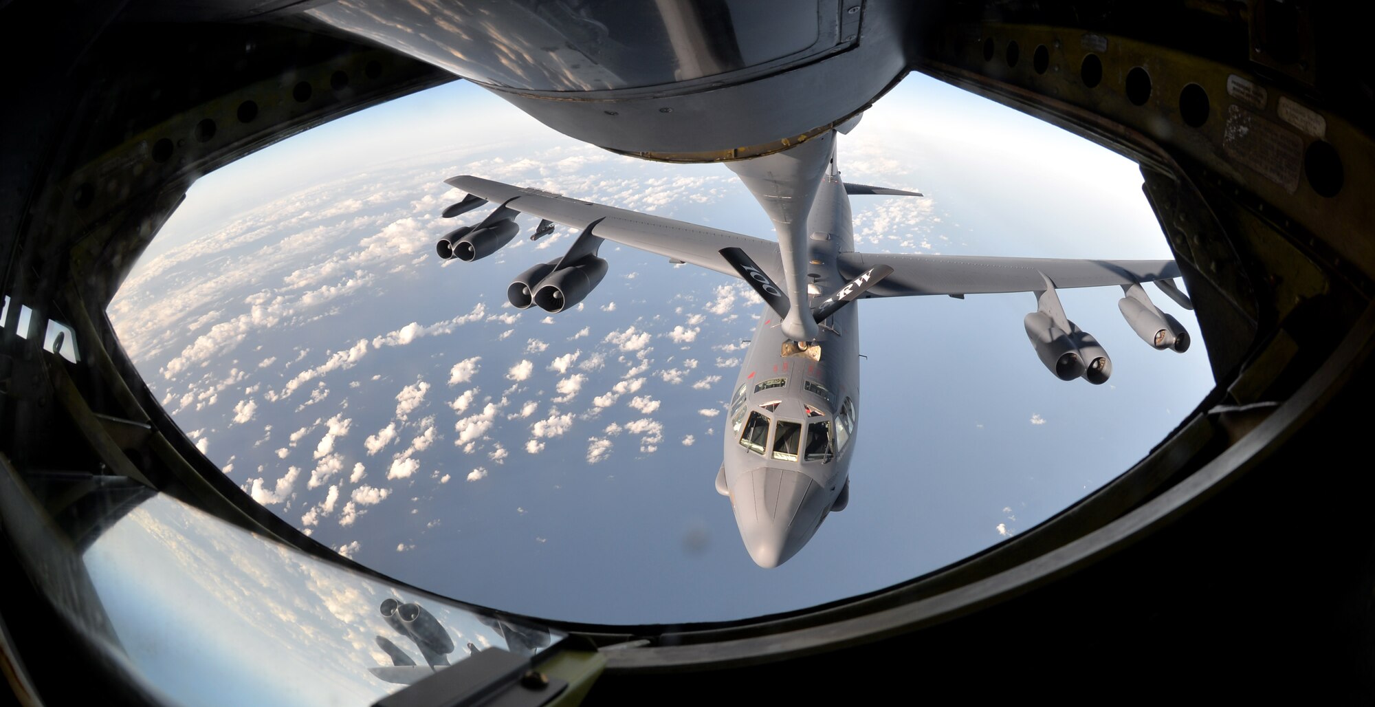 A B-52 Stratofortress from Barksdale Air Force Base, Louisiana, takes fuel from a KC-135 Stratotanker assigned to the 100th Air Refueling Wing at RAF Mildenhall, England, Sept. 18, 2015, in the skies near Spain. The refueling was part of Operation Immediate Response, which included a three-ship formation of KC-135s delivering a total of 180,000 pounds of fuel to the sole bomber. The KC-135 was designed and built during the Cold War specifically to deliver fuel to the B-52. (U.S. Air Force photo by Tech. Sgt. Austin M. May/Released)