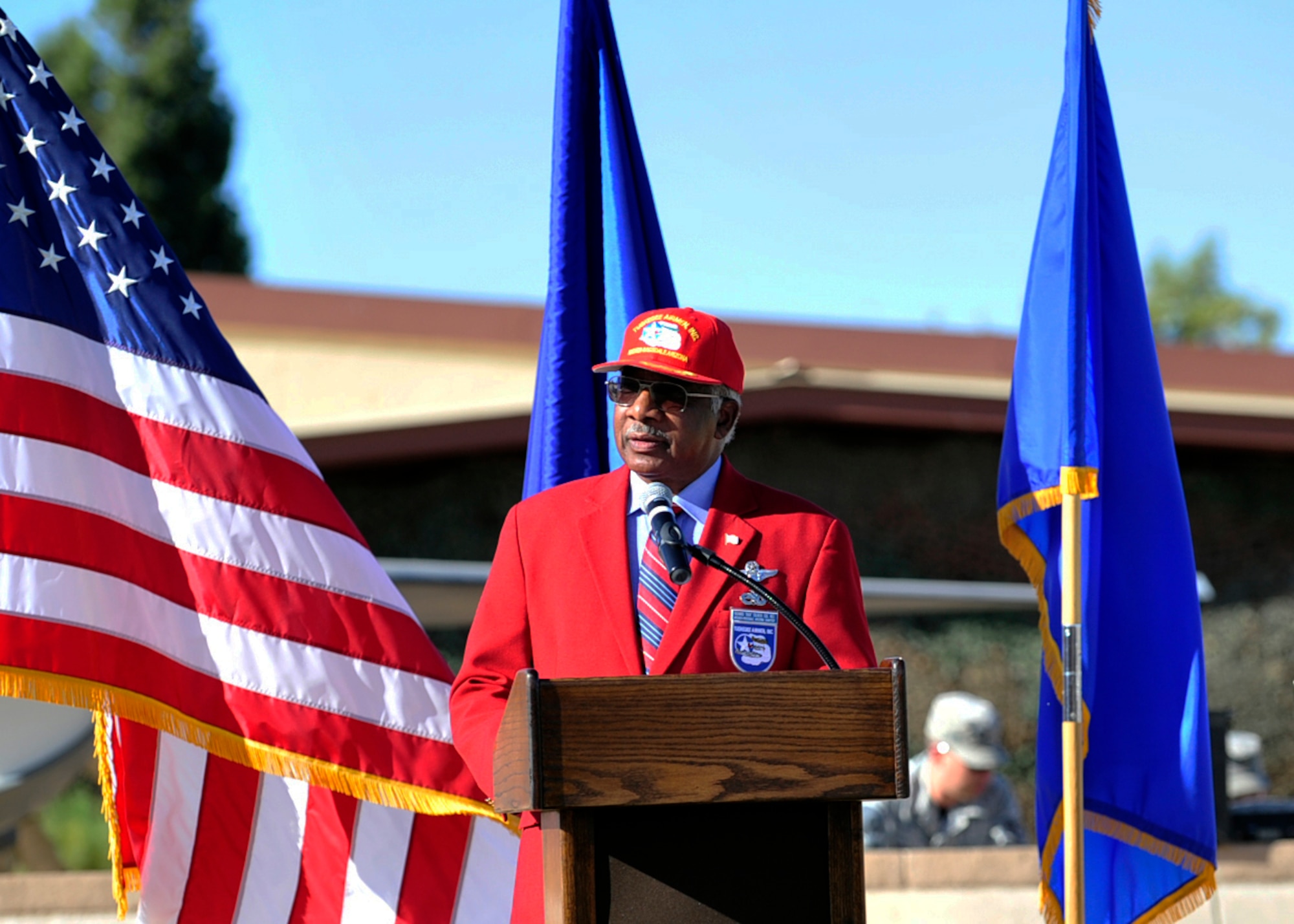 Ret. Air Force Col. Richard Toliver, guest speaker at the POW/MIA Recognition Day Retreat ceremony, talked about those who are prisoners of war or missing in action, the history behind the day and more Sept. 18, 2015 near the wing headquarters building at Luke Air Force Base, Ariz. Hours before the ceremony, 72 Luke Airmen took shifts guarding the flag in support of the 24-hour vigil leading up to the ceremony. (U.S. Air Force photo by Senior Airman Grace Lee)