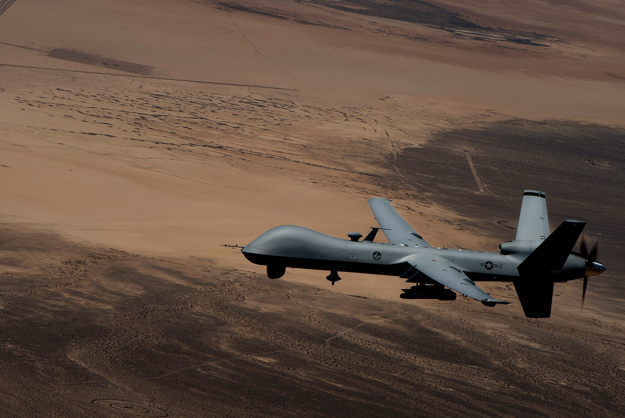 Between August and October of 2014 the Remotely Piloted Aircraft community participated in operations which provided aid to Iraqi citizens who were being threatened by the Islamic State of Iraq and the Levant on Mount Sinjar, Iraq. Overall, the airdrops, provided 682 bundles of supplies containing 362,212 bottles of drinking water, 116,316 meals, 1,008 tents and 1,124 lanterns to Sinjar, and 145 bundles, 96,226 water bottles and 12,137 meals to Amirili. (U.S. Air Force photo by Senior Airman Cory Payne)