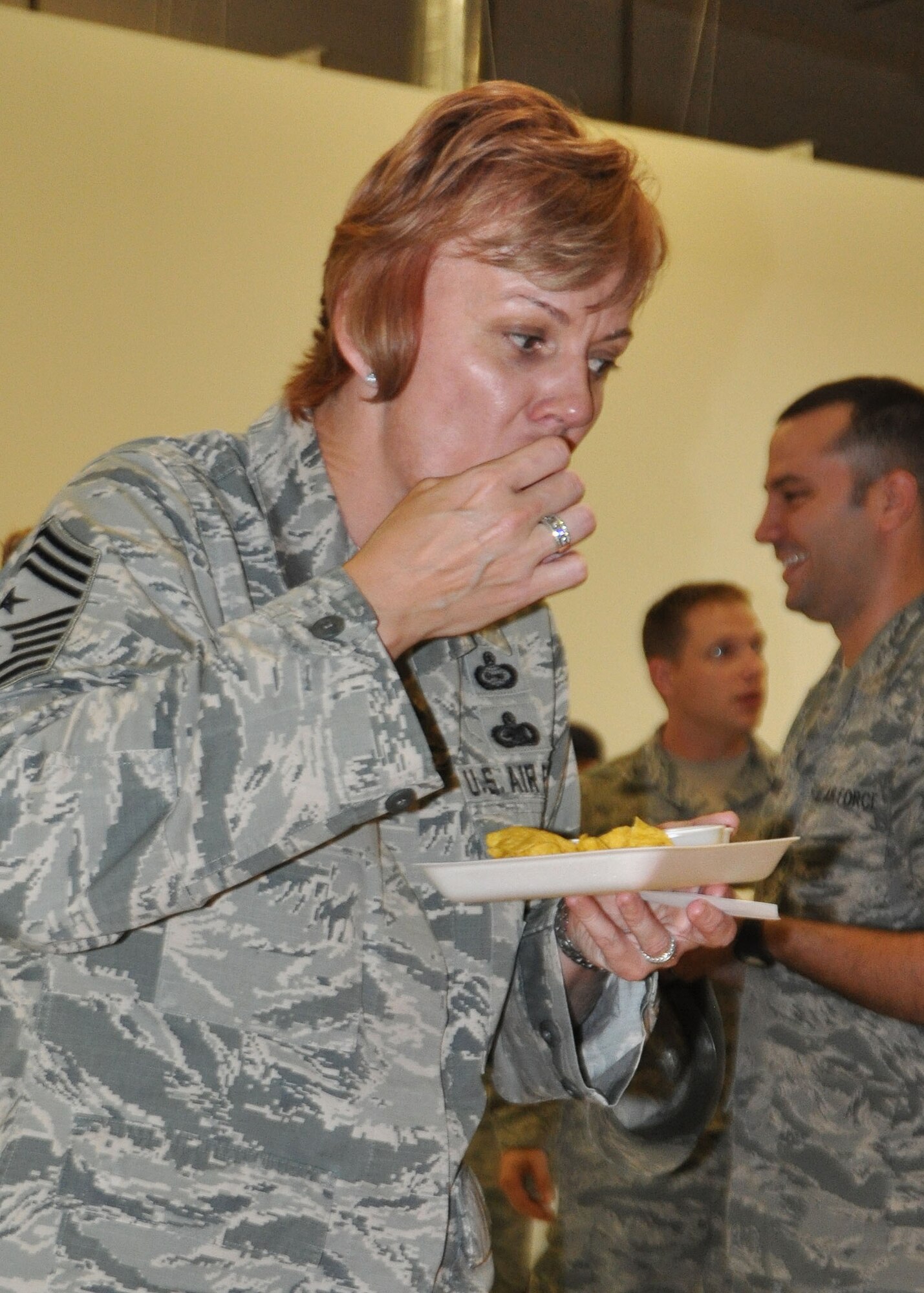 Chief Master Sgt. Rhonda Hutson, 944th Fighter Wing command chief, bites into a chip with salsa during the fourth annual 944th FW salsa contest Sept. 12 at Luke Air Force Base, Ariz. (U.S. Air Force photo by Tech. Sgt. Barbara Plante)