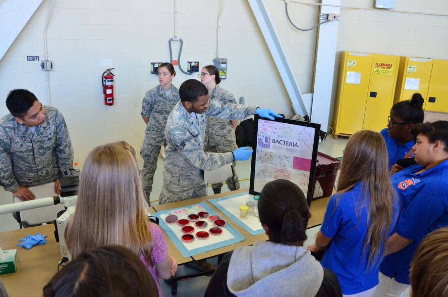 Senior Airman Dominic Anderson, a microbiology specialist with the 81st Medical Group talks about blood pathogens to students from Gulfport High School during a science, technology, engineering and mathematics day for South Mississippi high schoolers at Keesler Air Force Base September 18, 2015. (U.S. Air Force Photo/Master Sgt. Brian Lamar)