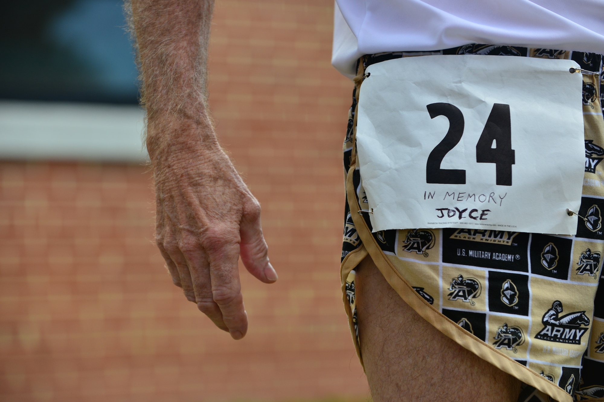 Seventy three year old retired U.S. Army Veteran Doug Berry of Norfolk, Va., completes the Mulberry Island Half Marathon at Fort Eustis, Va., Sept. 19, 2015. Berry runs the marathon annually in memory of Joyce Swinton, who worked at Anderson Field House , and lost her battle to cancer in 2005. ( U.S. Air Force photo by Staff Sgt. Natasha Stannard/Released)
