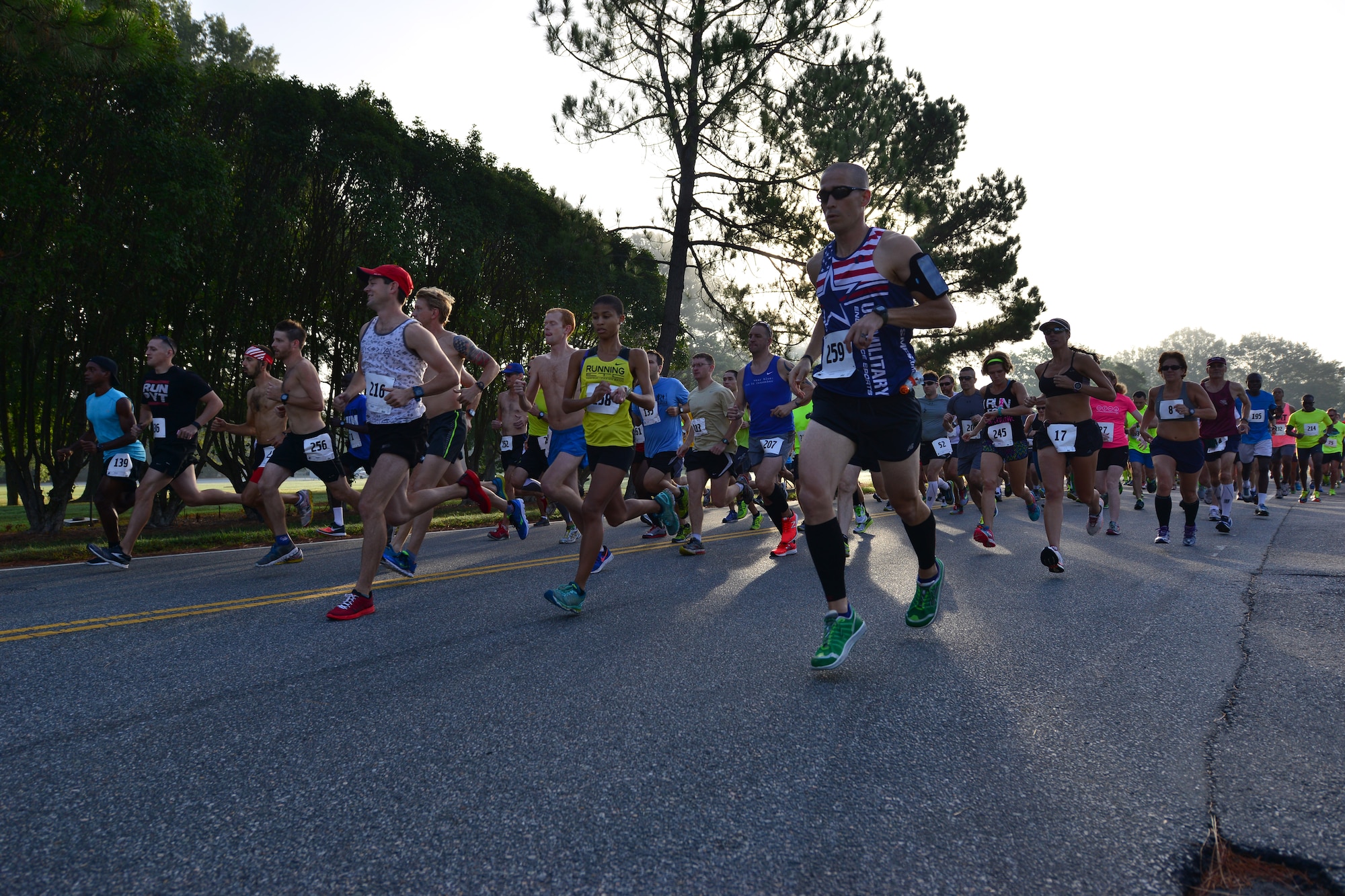 Mulberry Island Half Marathon participants take off from the race starting line at Fort Eustis, Va., Sept. 19, 2015. This is the race’s, which also includes a 5K, 34th year in action. While on a military installation, the race was open to civilian runners as well to strengthen bonds with the community. (U.S. Air Force photo by Staff Sgt. Natasha Stannard/Released)
